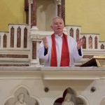 Fr Mangan giving his blessing to Parishioners online