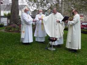 Lighting Pascal Candle at Easter Vigil Mass