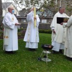 Lighting Pascal Candle at Easter Vigil Mass